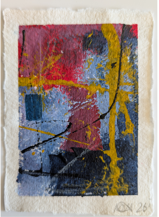 An abstract art print on textured handmade paper, featuring expressive splatters and blocks of red, yellow, blue, black, and pink, with a white border and a signature in the bottom right corner.